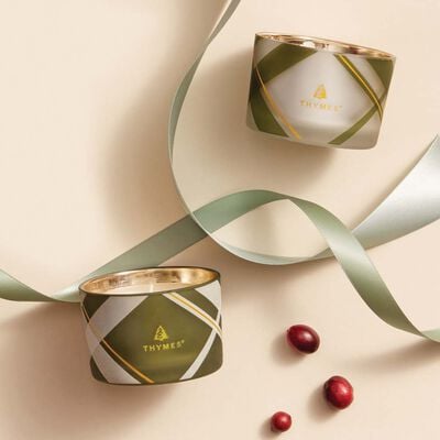 Thymes Frasier Fir Frosted Plaid Candle Set flatlay of candles with ribbon